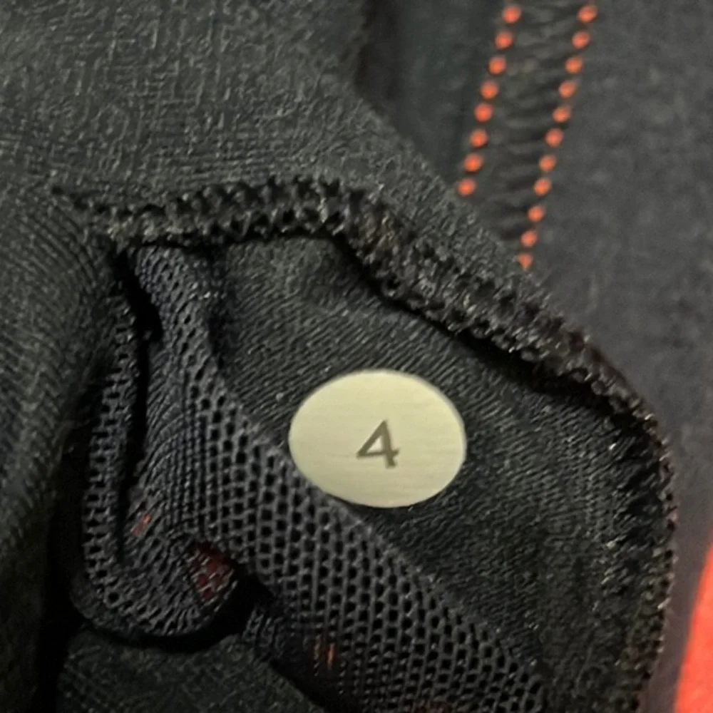 Lululemon orange & black Workout top Size 4